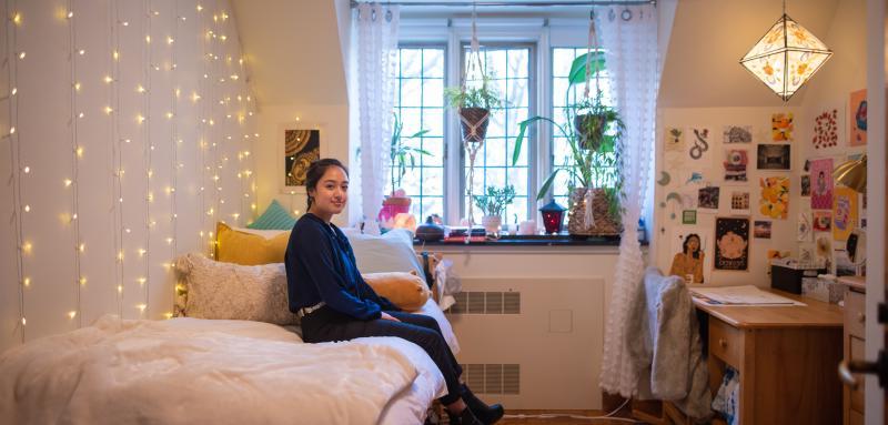 student in dorm room